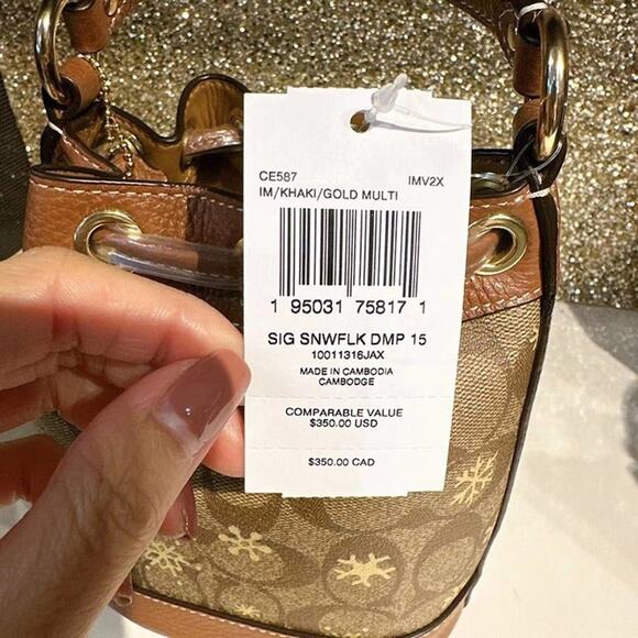 Coach CE587 Dempsey Drawstring Bucket Bag 15 With Snowflake Print Im/Khaki/Gold - Picture 8 of 9